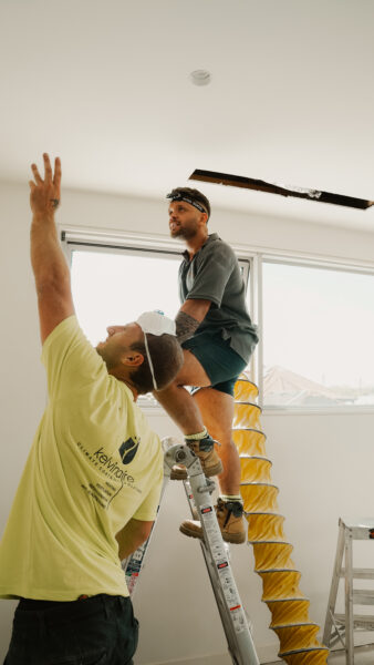 Kelvinaire air conditioner installer working for ducted air conditioning installation